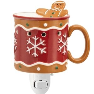 Scentsy gingerbread man mini warmer.
